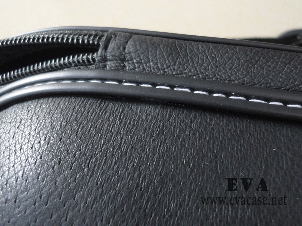 Genuine leather champagne carrier with plastic piping